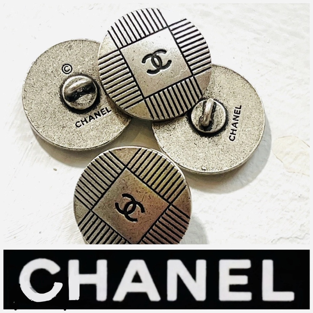 Vintage lot of four CHANEL Silver Logo Buttons stamped on back
